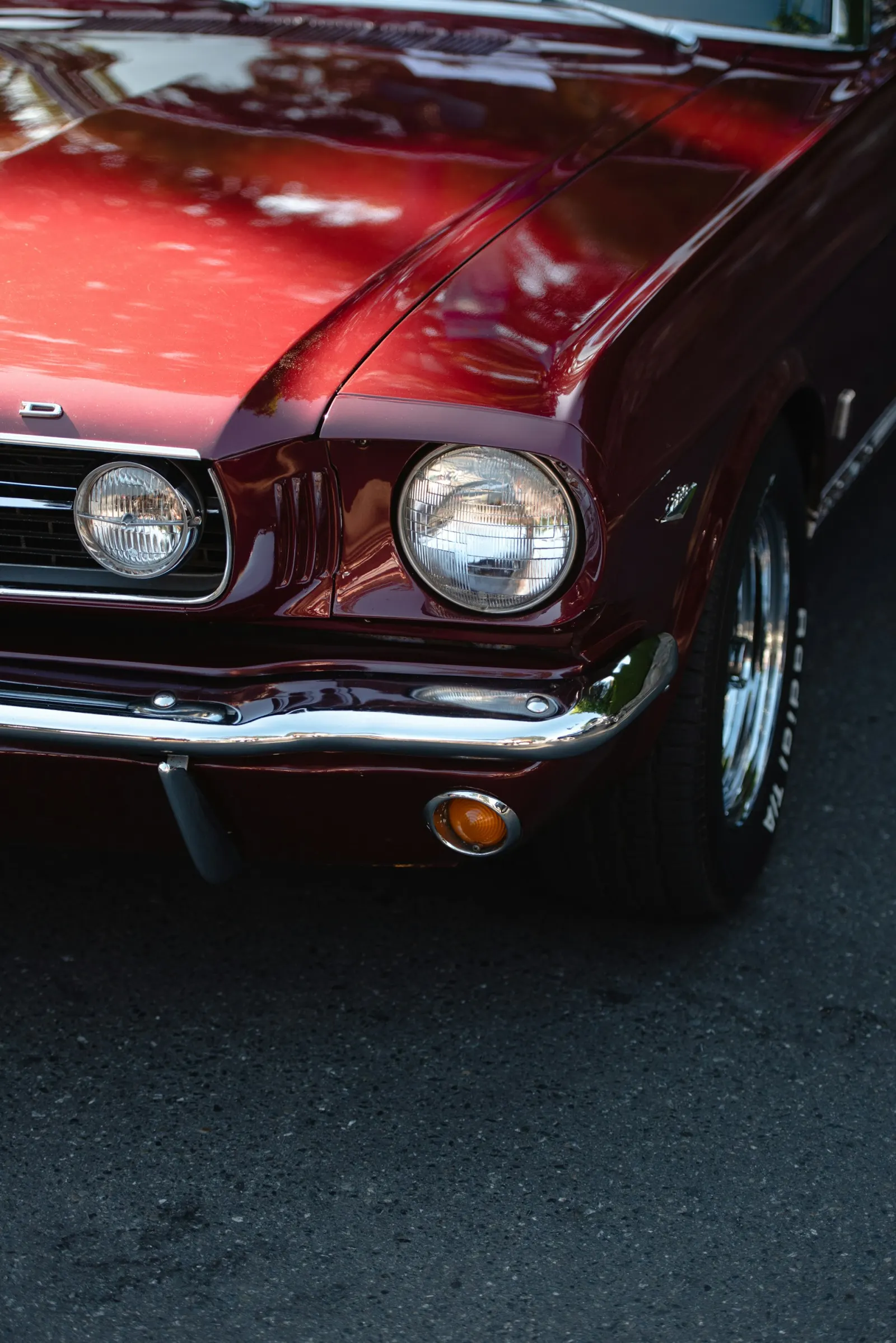 Maroon classic Mustang, front detail