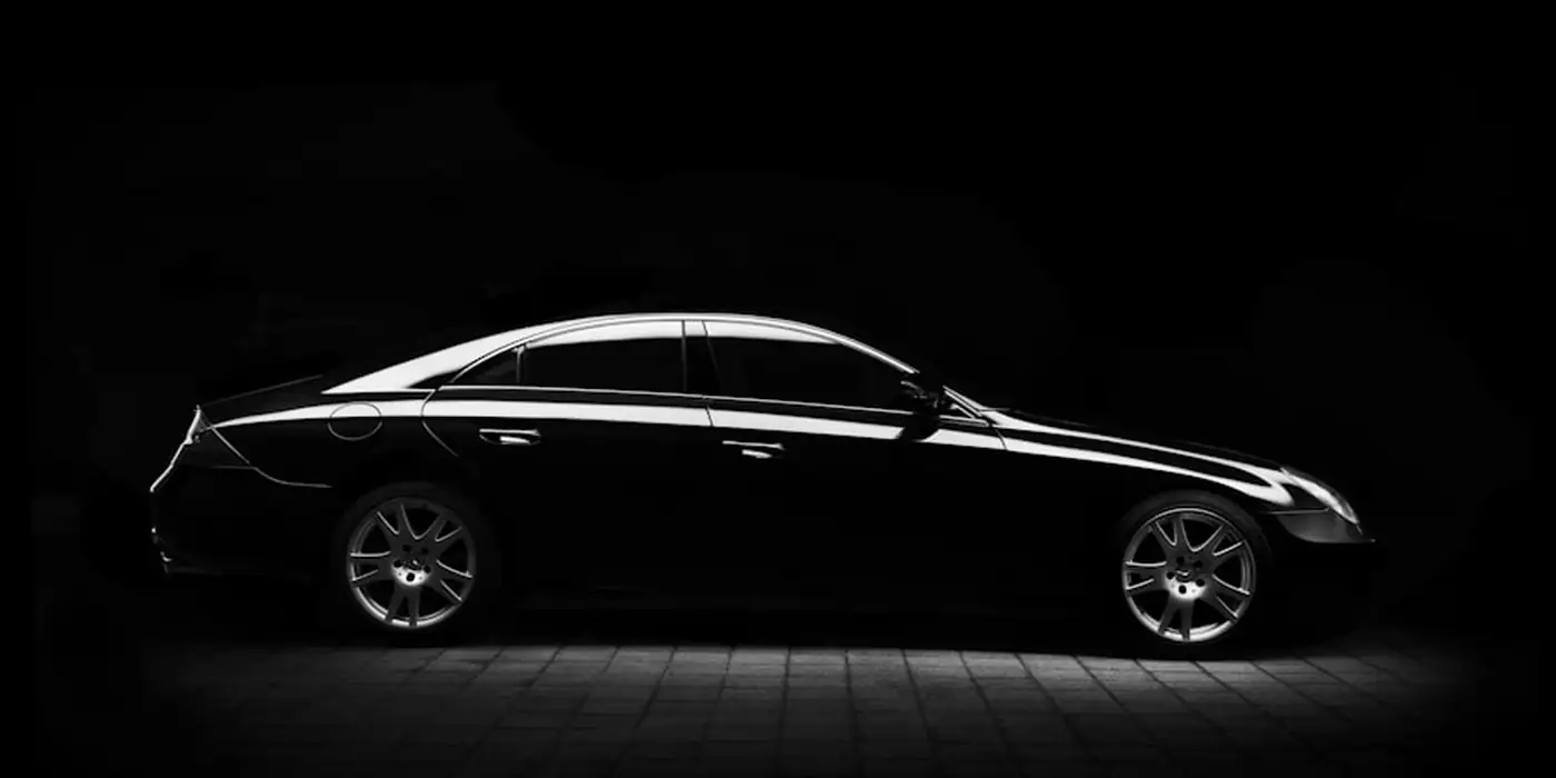 Mercedes saloon in silhouette